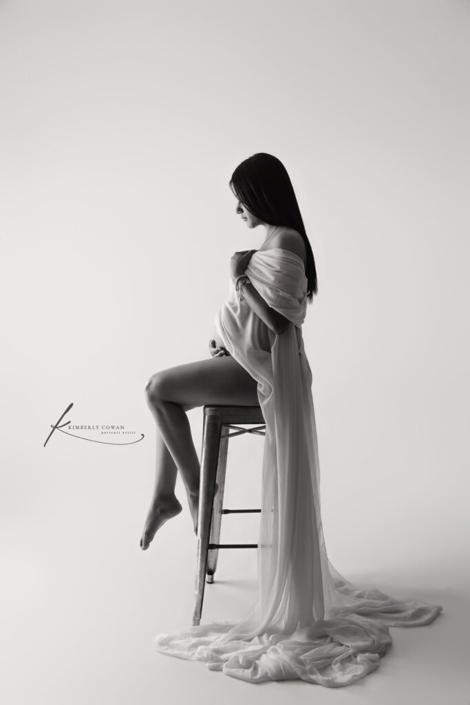 Beautiful expecting mother during a studio maternity session with Kimberly Cowan Photography, Midland Texas maternity photographer.